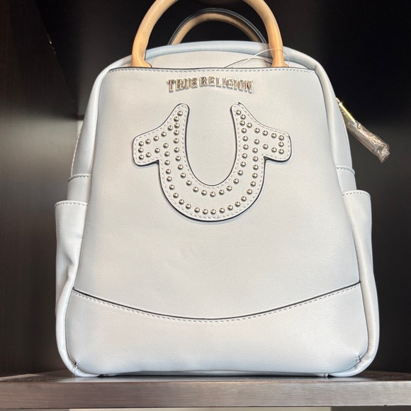 True Religion Handbags - True Religion Blue Backpack with Studded Emblem